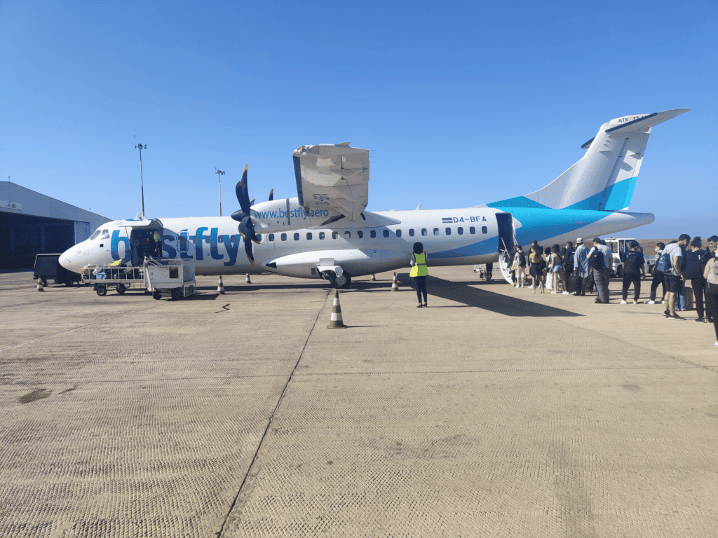 A side shot of a BestFly aeroplane loading passengers.