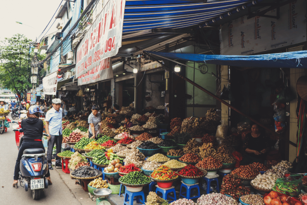 A local market, full of fresh produce lining the streets.