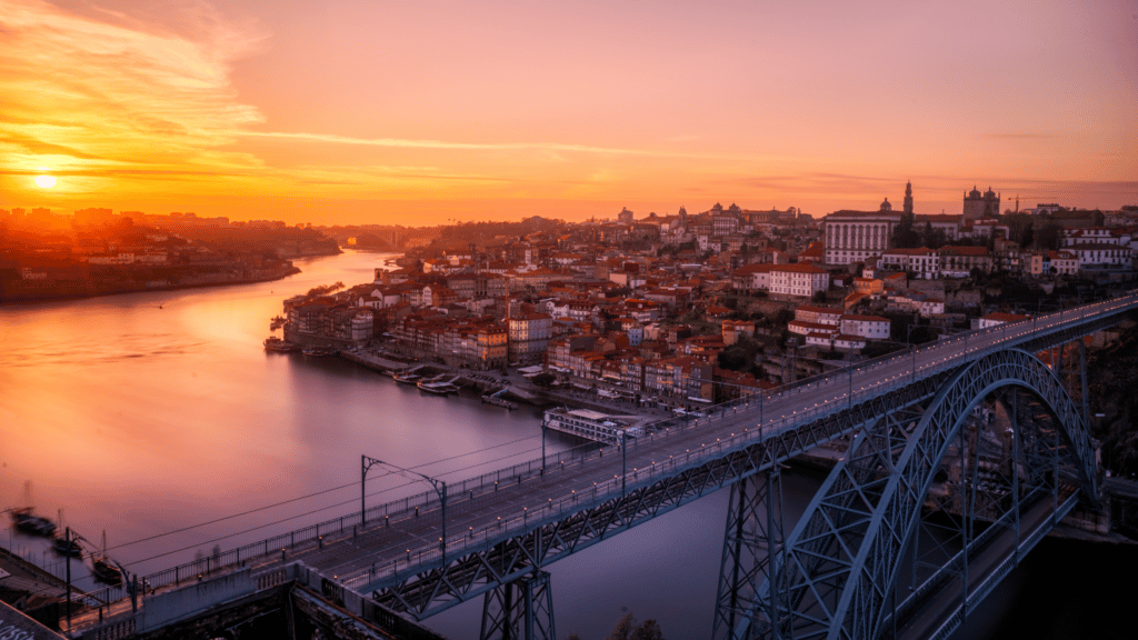 The sunset basks the city of Porto, Portugal, in glorious shades of orange.