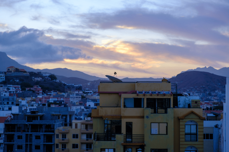 Dawn breaks in Mindelo, washing the city in a deep blue.